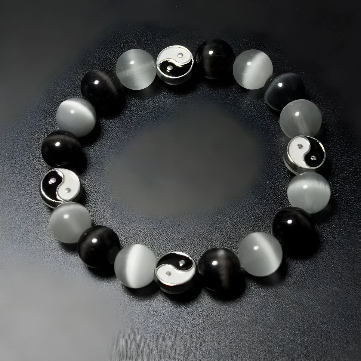 Natural stone Tai Chi bracelet with 10mm opal and black agate beads in traditional Chinese design