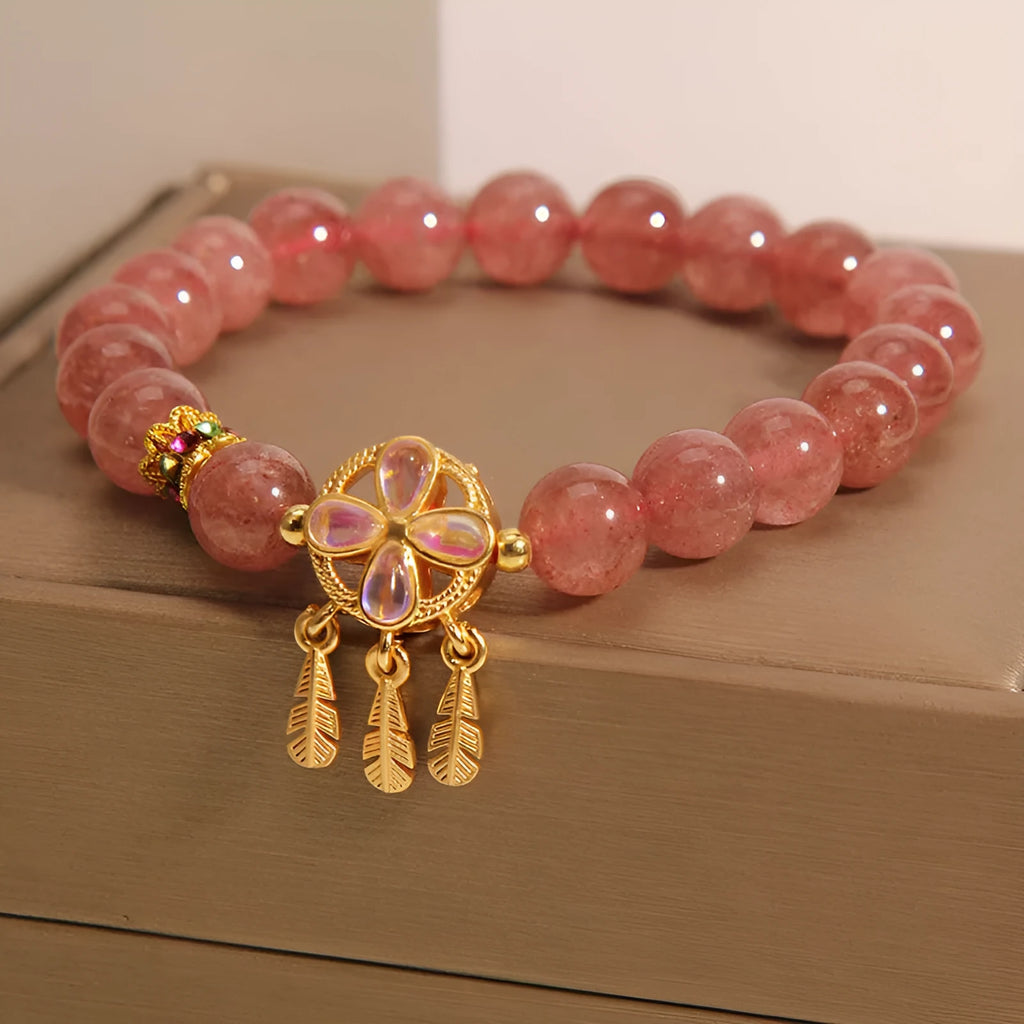 Women's strawberry quartz bracelet with four leaf clover dream catcher pendant charm