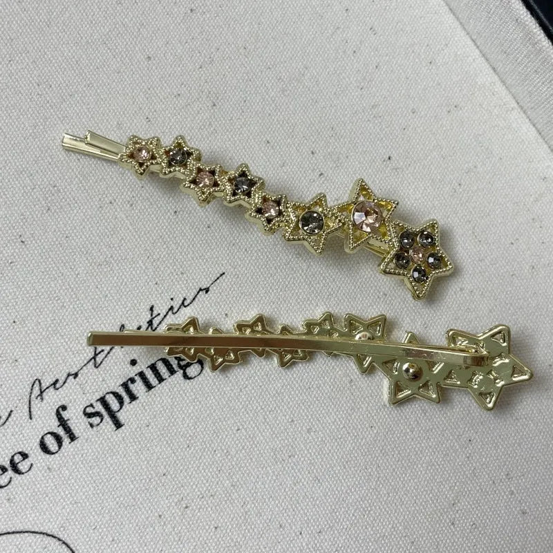 Gold electroplated rhinestone hair clip with Korean style star design for bangs