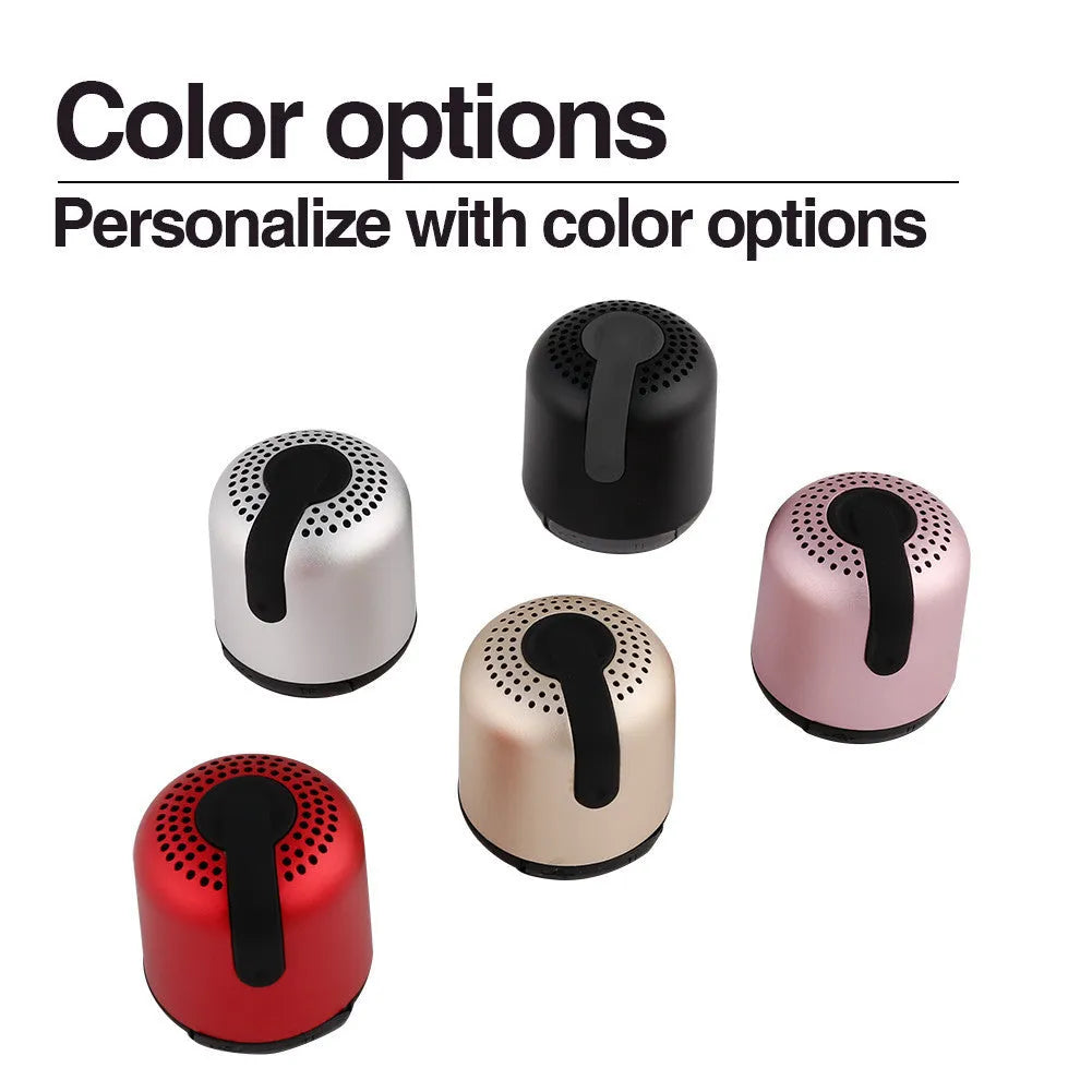 Hieha XQ11 mini cylindrical Bluetooth speaker in metal case, shown in multiple colours.