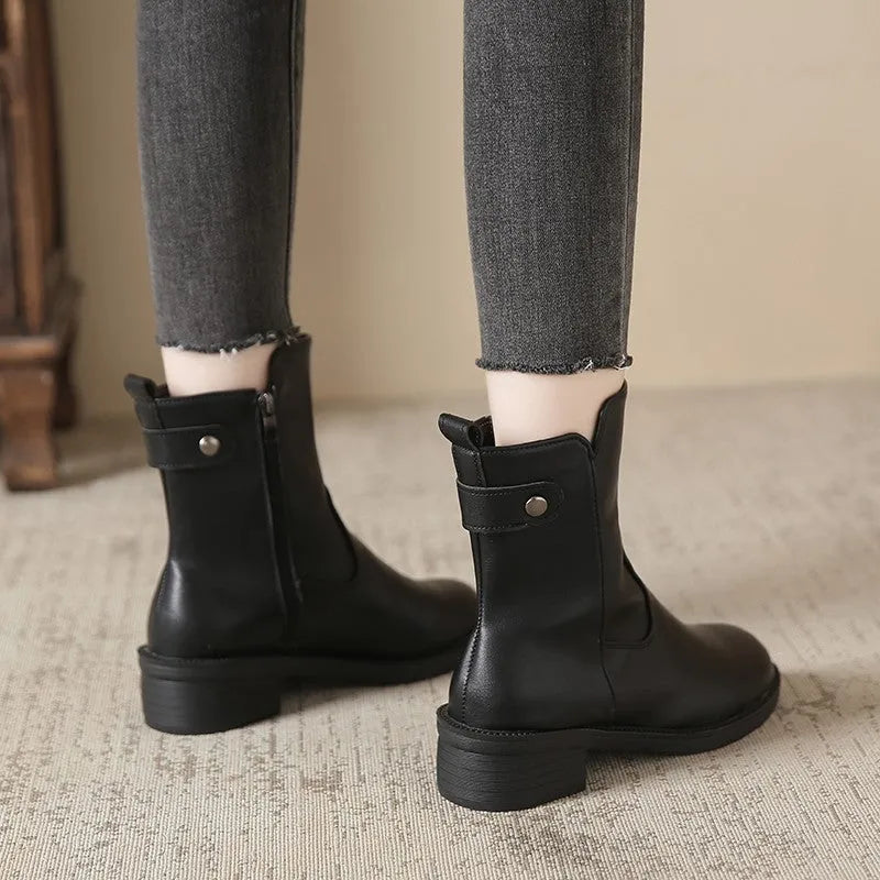Black women's low heel ankle boots with side zip and round toe