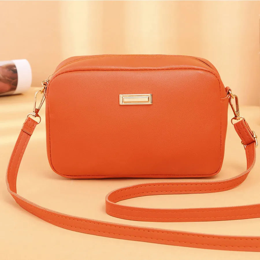 Solid colour PU leather ladies shoulder bag with three-dimensional pocket design in horizontal square shape