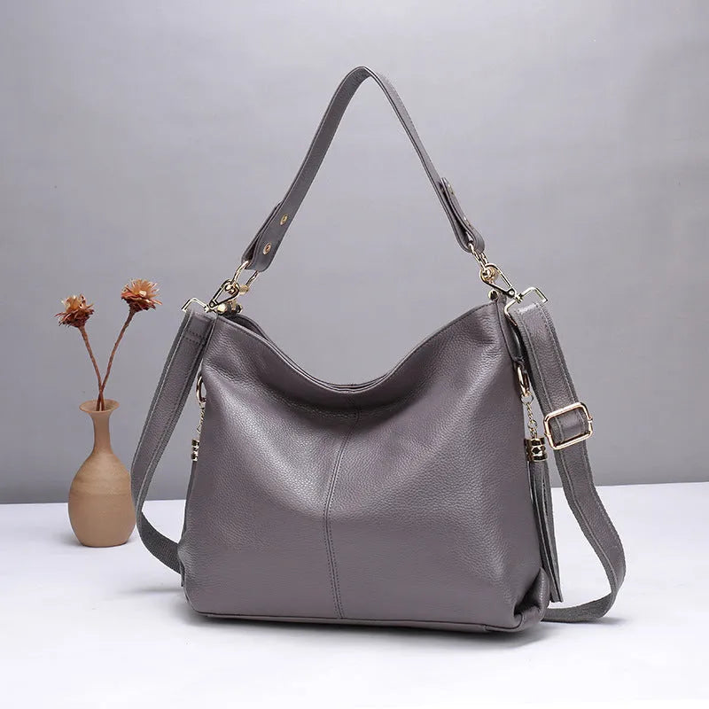 Genuine leather crossbody bag in square vertical shape with internal zipper organisers