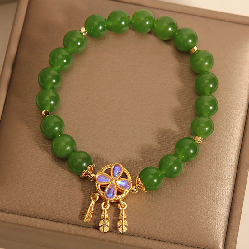 Green jasper bracelet with a four-leaf clover dream catcher crystal pendant for women.