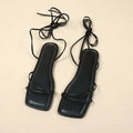 Women's flat sandals with ankle ring bandage detail and front lace-up closure in solid colour