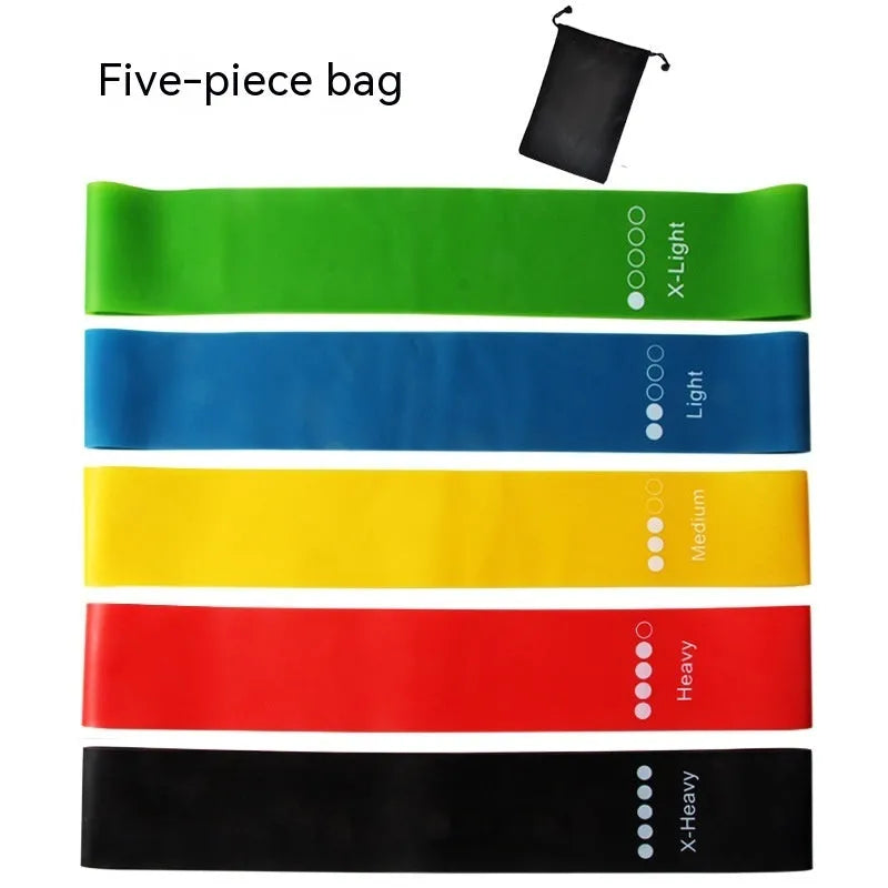 Five yoga tension straps in different colours with force markings for progressive resistance training