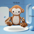 Lion and monkey soft plush squeaky dog toys side by side
