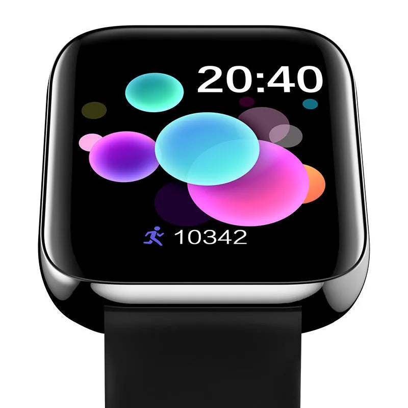 Black smart bracelet with zinc alloy body and silicone strap on a wrist, displaying a blood pressure reading on its screen.