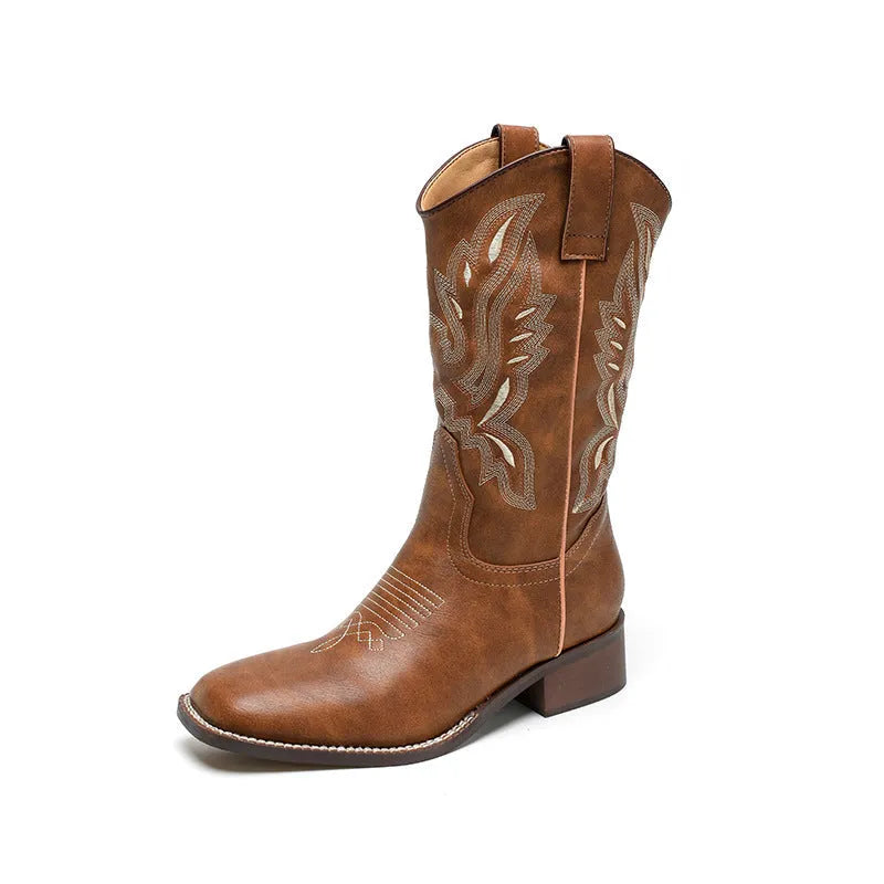 Brown women's mid-calf lace-up Martin boots with embroidered pattern on the upper.