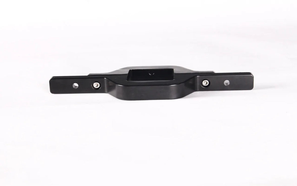Black trailer hook lamp bracket for off-road vehicle modifications showing single-piece design