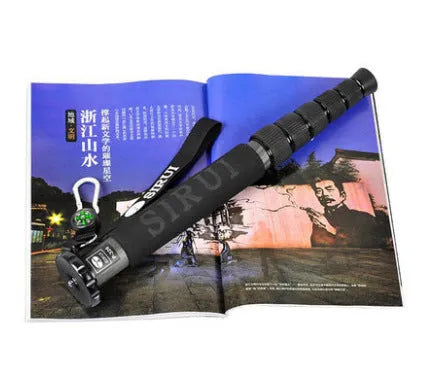 Black carbon fibre SLR camera monopod with six telescopic sections extended