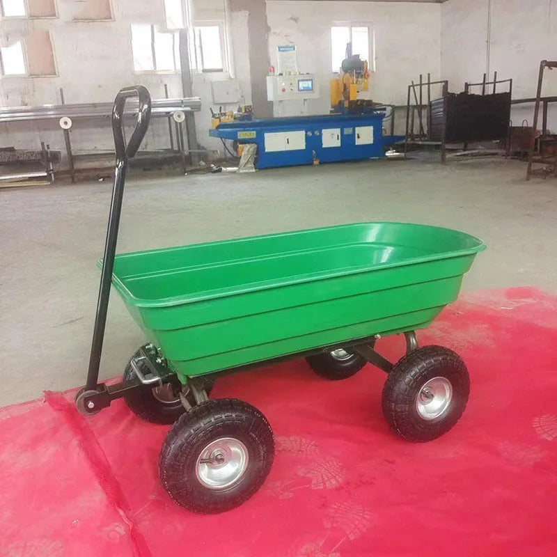 Green four-wheel plastic dump truck with a large load bed, model TC2145.