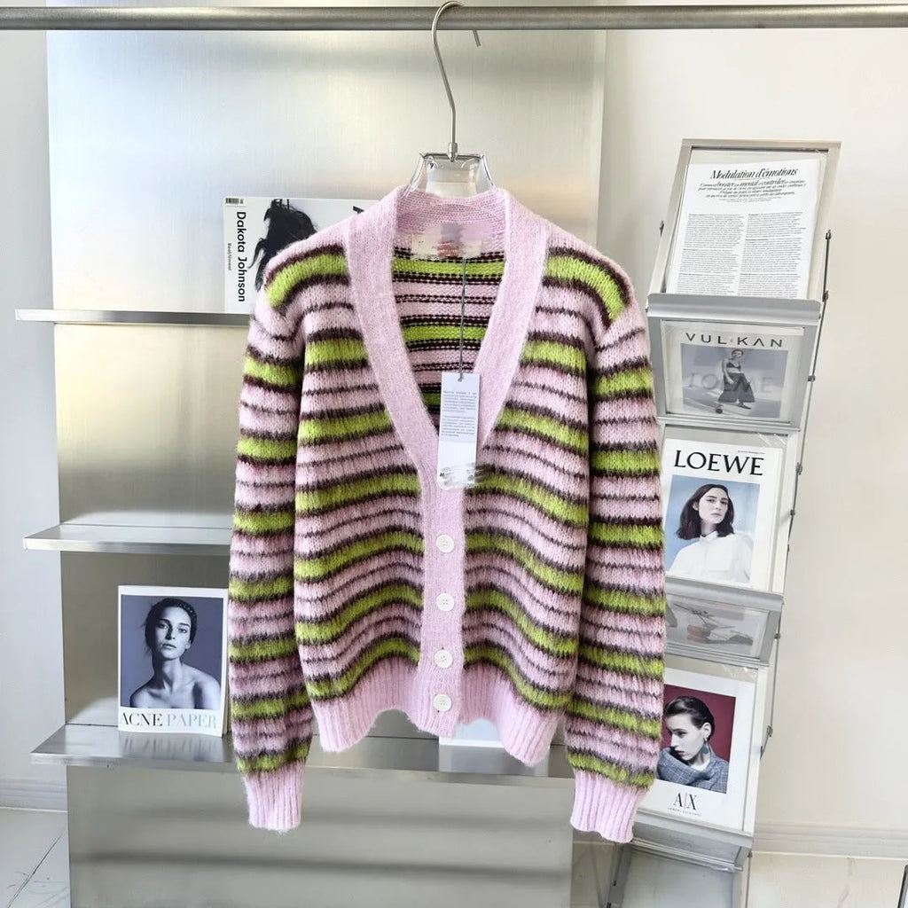 Pink Haima wool knitted cardigan sweater on a hanger, showing round-neck and open cardigan styles.