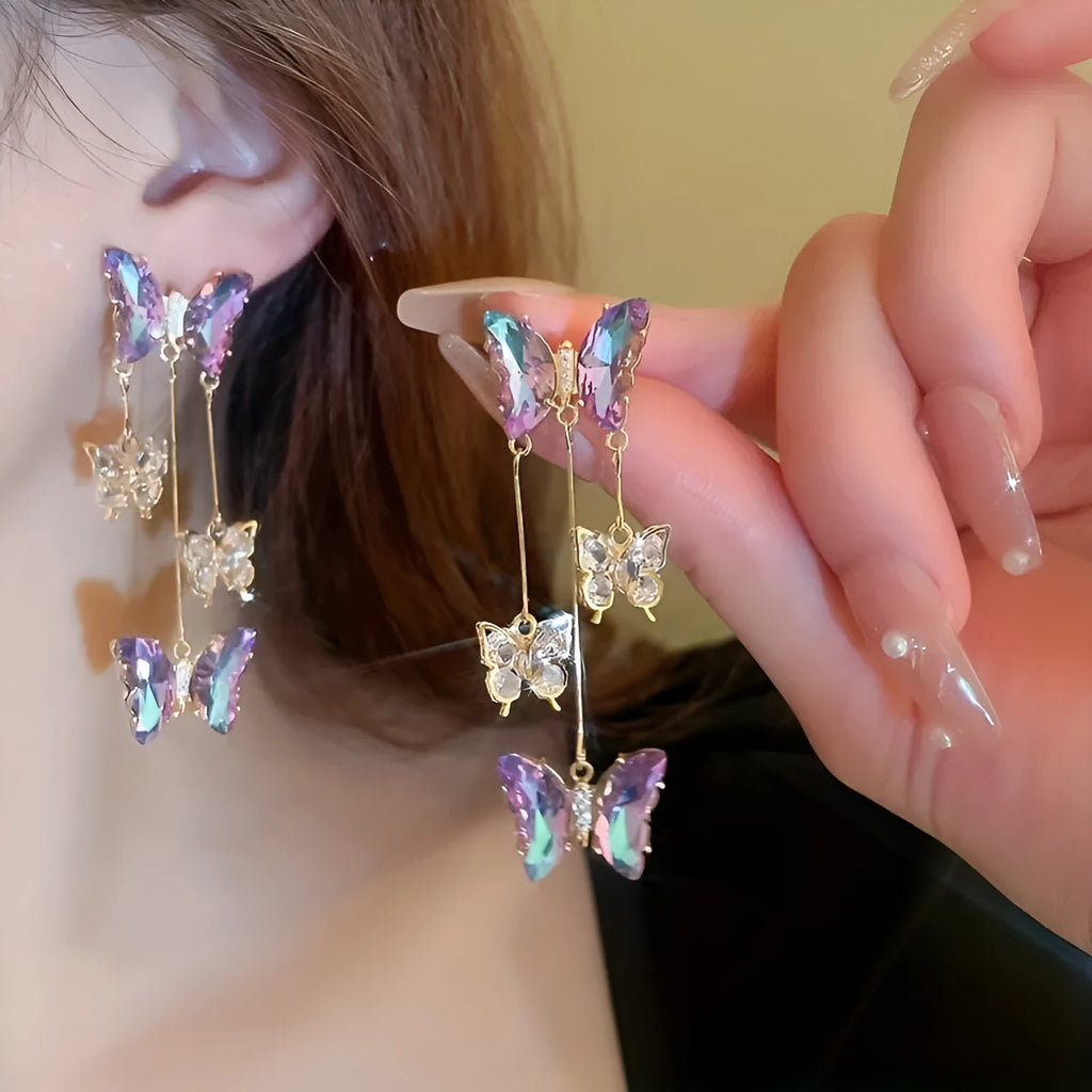 Blue purple butterfly tassel earrings with crystal flower decoration on silver electroplated alloy