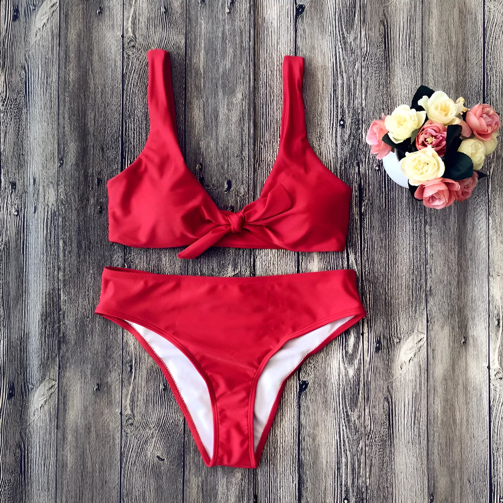 Women's solid colour polyester bikini swimsuit set in black, pink, red, white, or wine red.