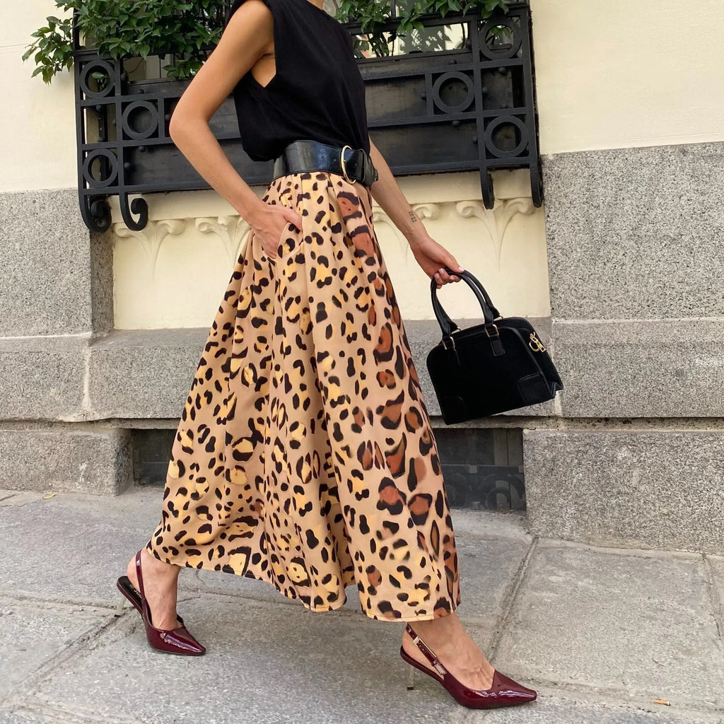 Women's brown leopard print A-line long skirt with big hem design on mannequin