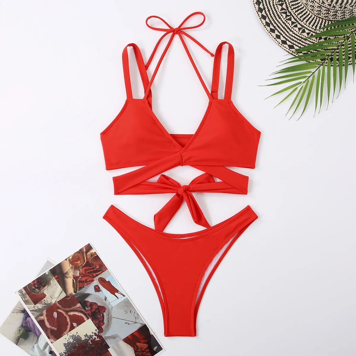 Women's solid colour strap bikini swimsuit in black, shown on a mannequin.
