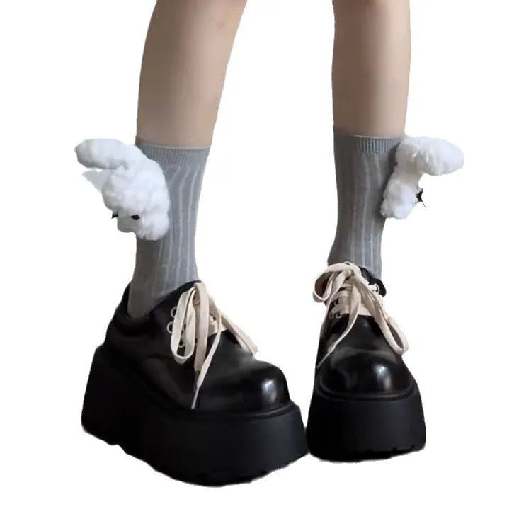 Matte black women's lace-up buckle boots with a thick sole and 6-8cm chunky heel on a white background.