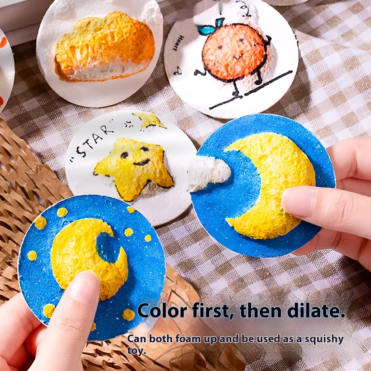 Wood pulp paper painting sponge set with heart, round, and square shapes next to six fountain pens.