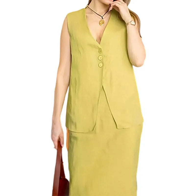 A woman wearing a blue sleeveless top and matching long skirt from a casual two-piece suit set.