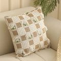 Square Jacquard floral pillow cushion cover in a retro colour, 45cm by 45cm, on a sofa.