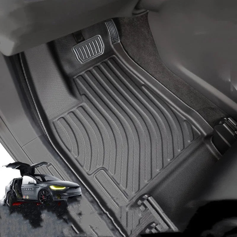 Tesla Model X waterproof black rubber floor mats and tailbox liner for left-hand drive.