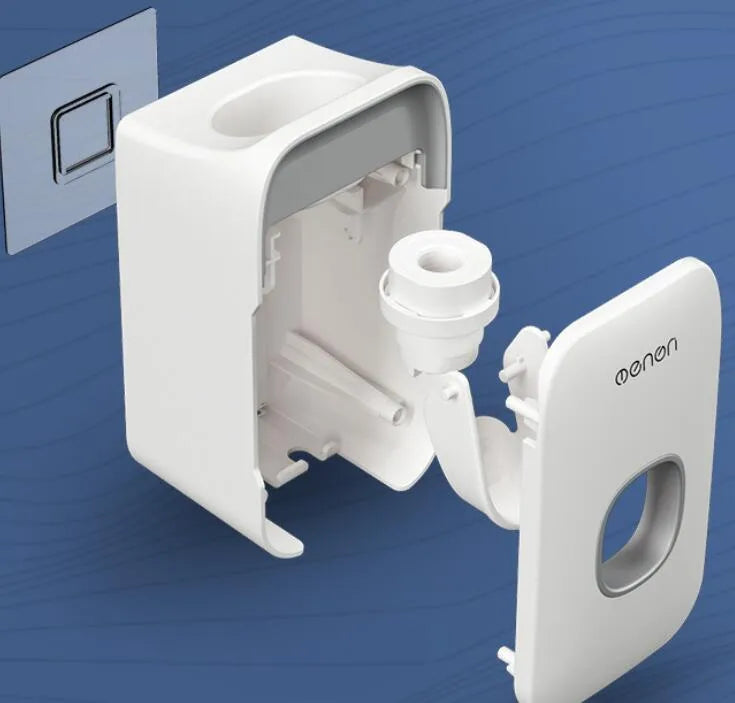 Automatic touchless toothpaste dispenser with digital LCD display mounted on a bathroom wall