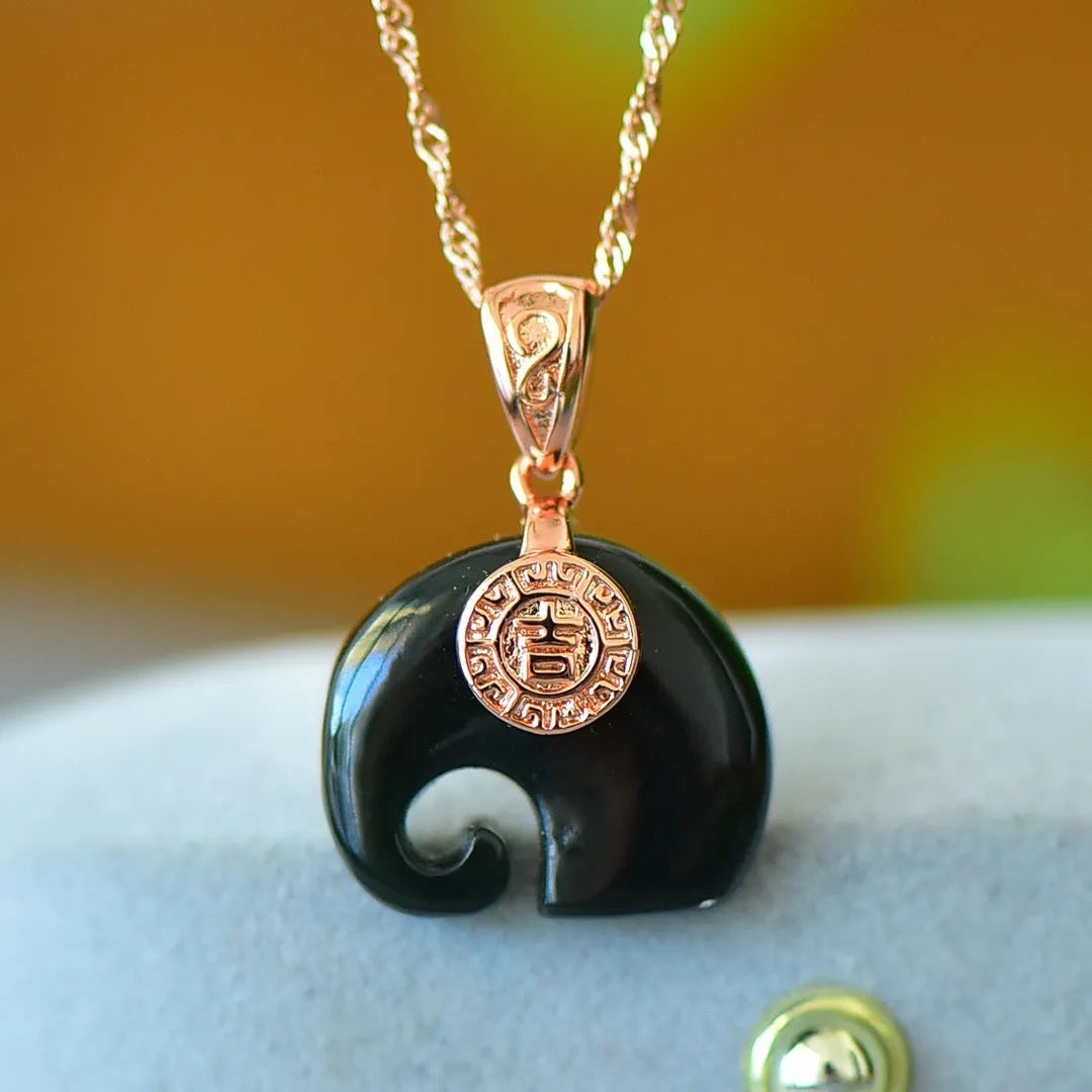 Natural grey Hetian jade pendant with copper inlay on a chain, modern simplicity style.