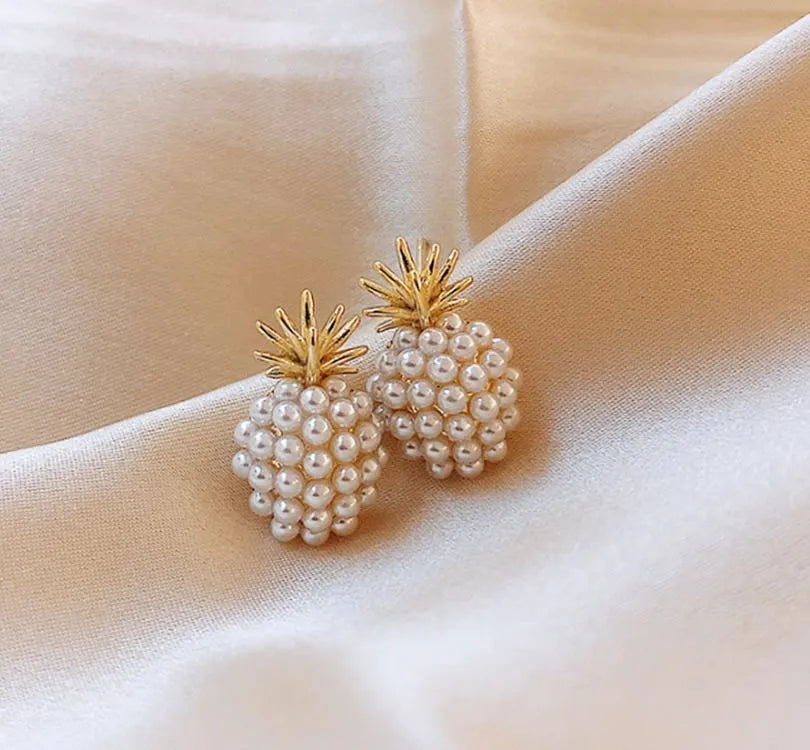 Korean style pineapple and starfish pearl design alloy earrings with electroplated gold, silver, pearl flower, and starfish pearl finishes.