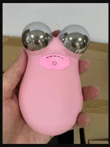 Pink HS-858 micro current facial lifting and firming device on white background