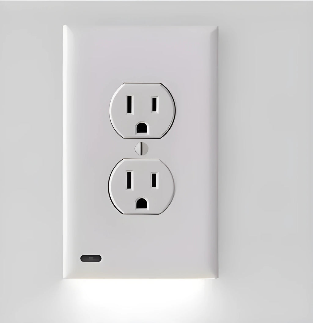 White plastic socket induction LED night light plugged into a wall outlet