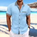 Man wearing a slim fit striped short sleeve casual shirt in pure cotton.