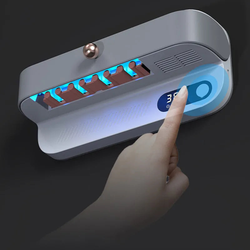 White wall-mounted smart toothbrush steriliser holder with UV disinfection and slots for 6 brushes.
