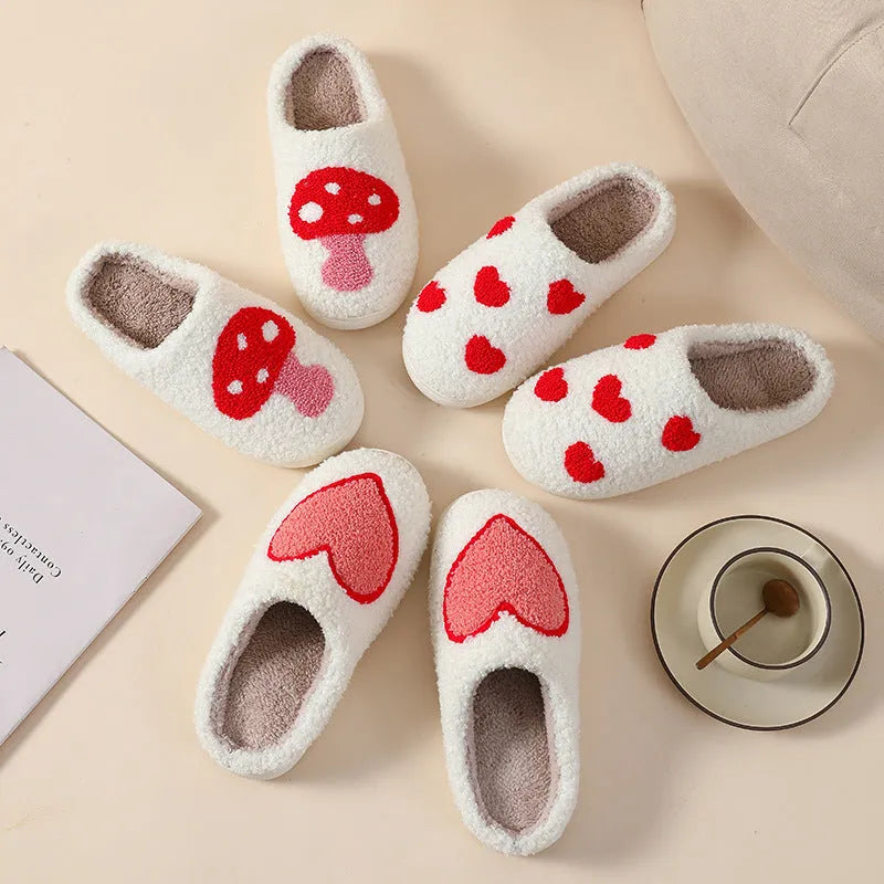 Women's plush cartoon love style home slippers with a round toe and PVC sole.