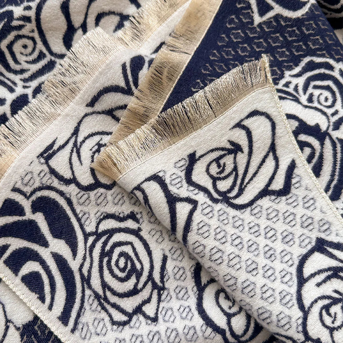 Imitation cashmere scarf measuring 185cm by 65cm with tassel fringe in winter colours