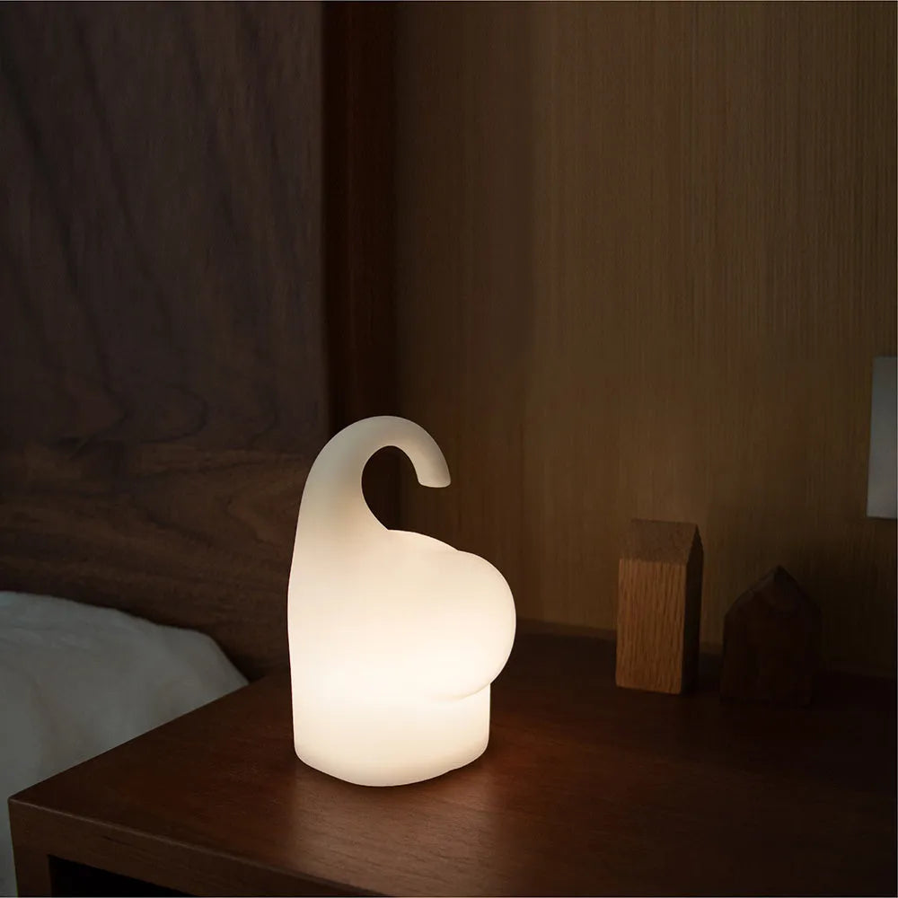 Elephant-shaped silicone night light with warm white LED glow for bedroom bedside use