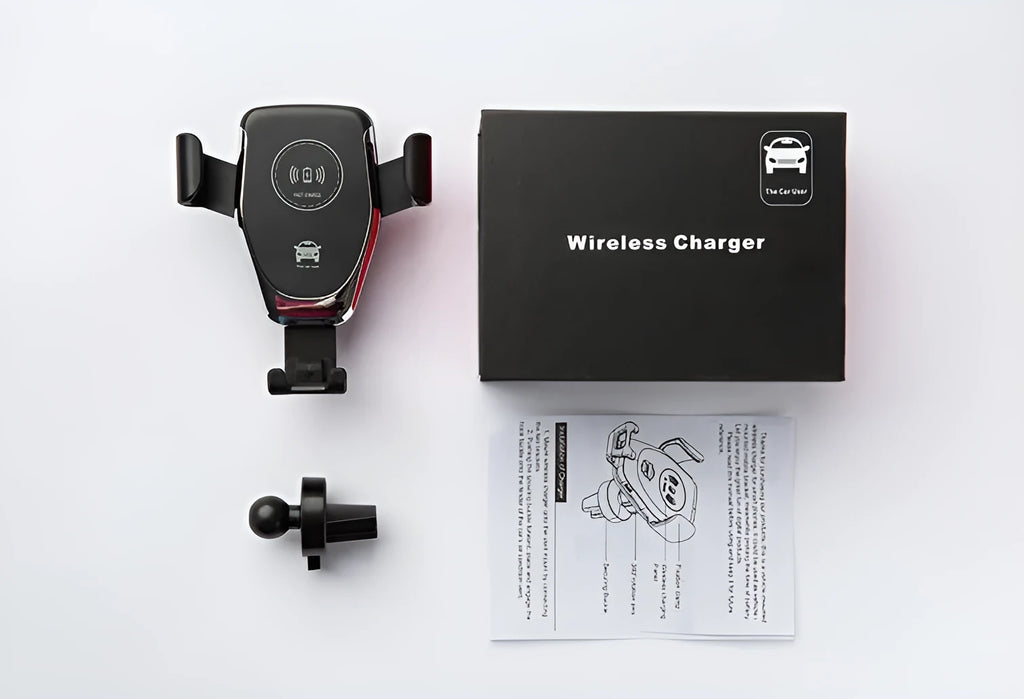 Black wireless car charger mounted on vehicle vent with iPhone automatically clamped in charging position