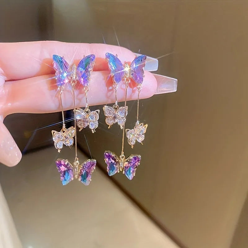 Blue purple butterfly tassel earrings with crystal flower decoration on silver electroplated alloy