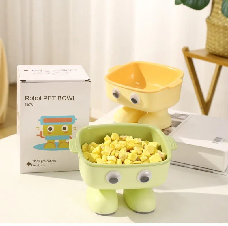 Green elevated cat bowl with 15° tilt, robot design, and anti-slip base
