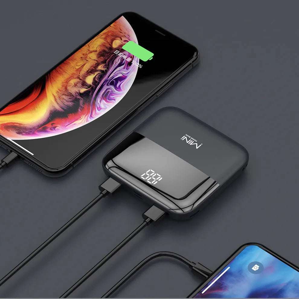 Android portable power bank with digital display and dual USB ports in black, pink, red, or white