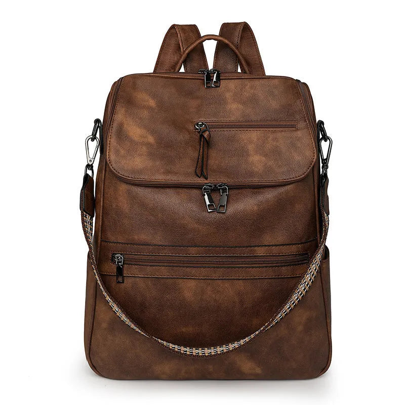 Retro college backpack in PU leather with curved shoulder straps shown in available colour variations