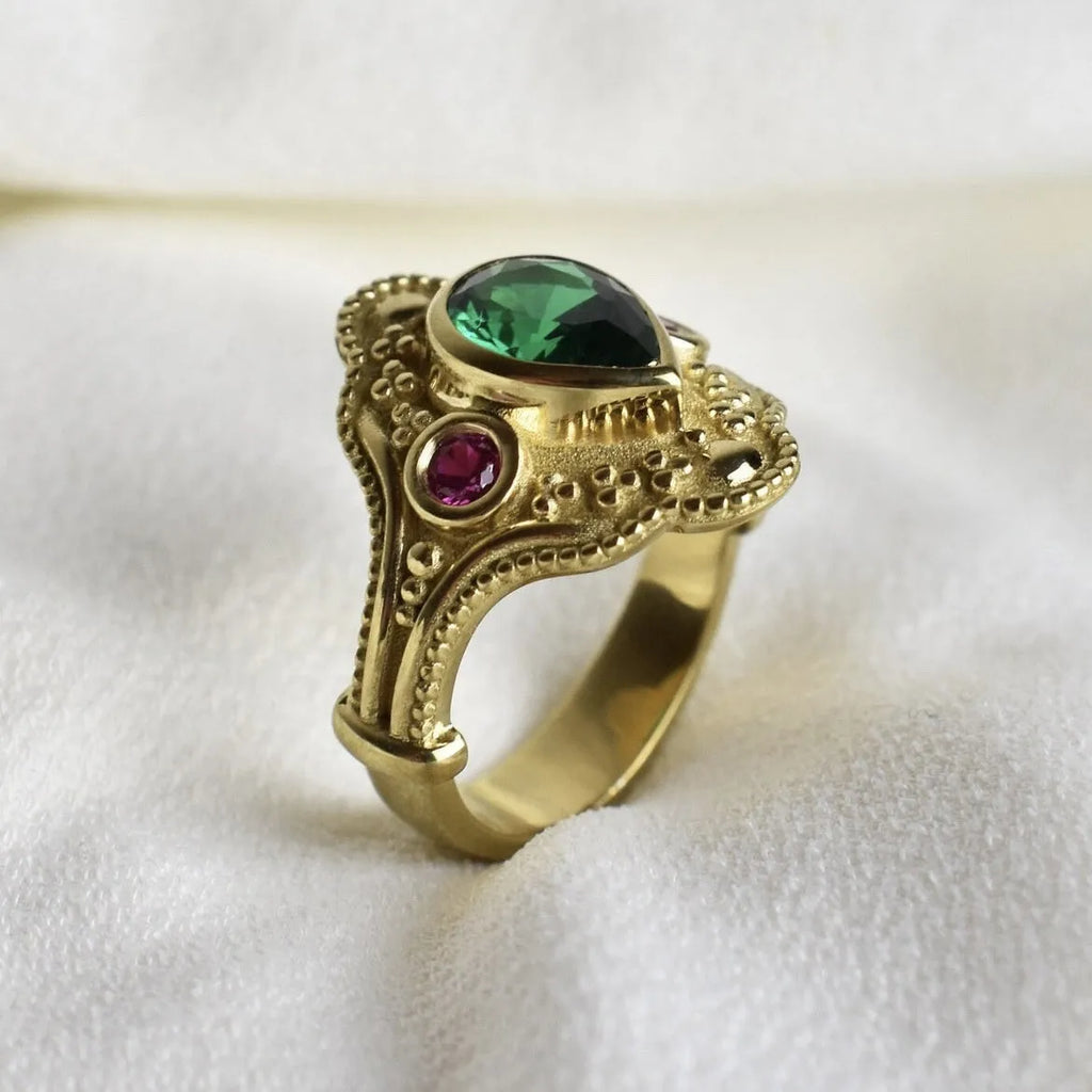 Golden geometric women's alloy ring with gold-plated electroplated finish.