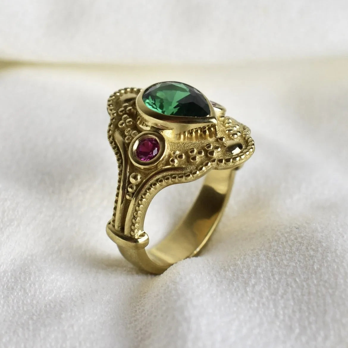 Golden geometric women's alloy ring with gold-plated electroplated finish.