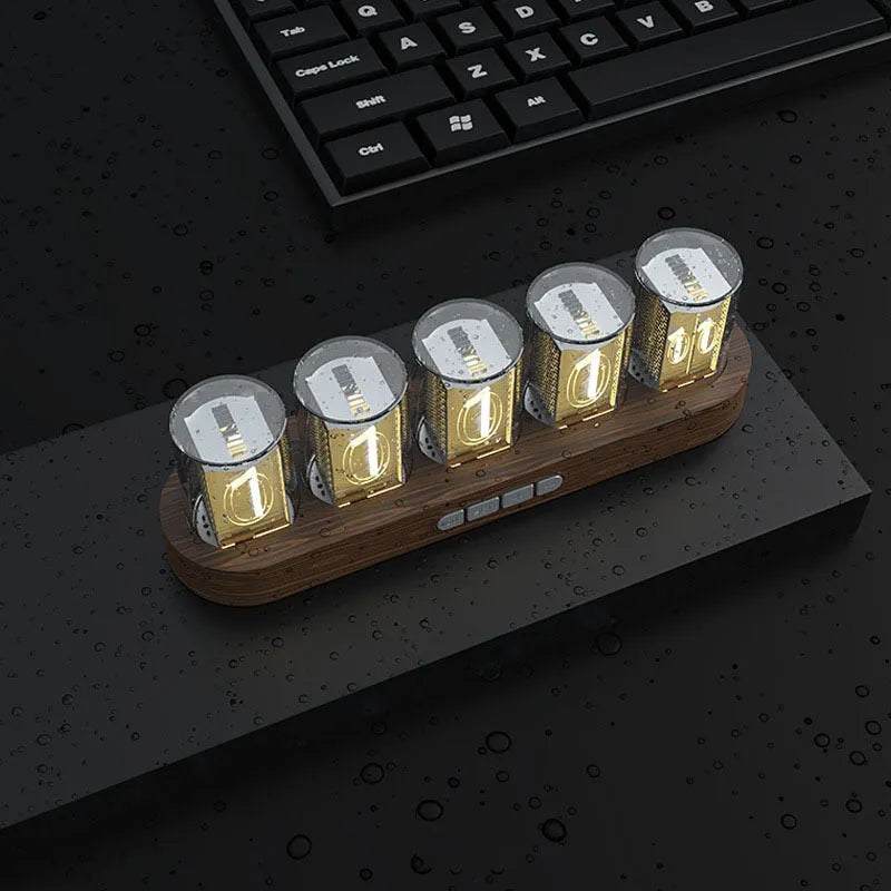 RGB Luminotron LED digital clock showing colourful display on desk in wood grain finish