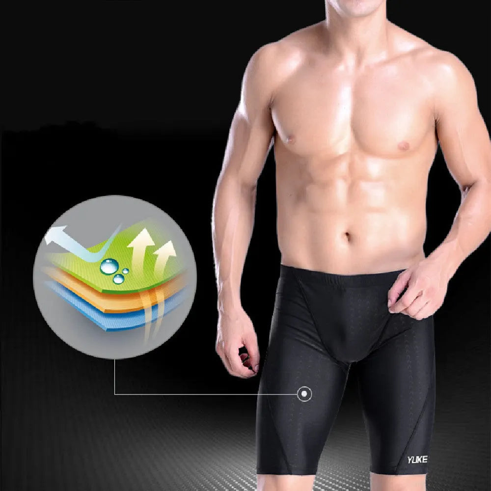Men's black swimming set with polyester trunks, anti-fog goggles, waterproof cap, accessories and carrying bag