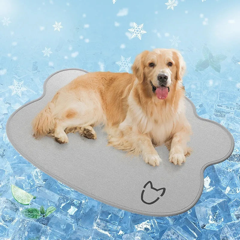 Ice silk pet cooling mat in dog head shape, shown in light gray, on a wooden floor