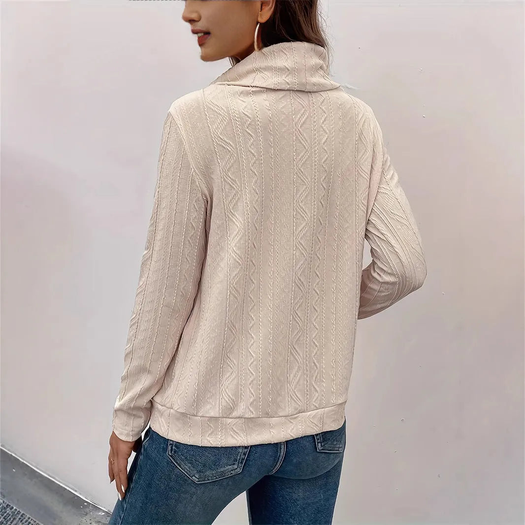 Apricot coloured hooded pullover sweater with long sleeves and drawstring adjustment