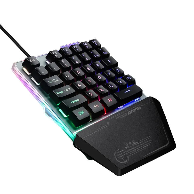 Black G40 one-handed mechanical gaming keyboard with RGB backlit keys on a desktop