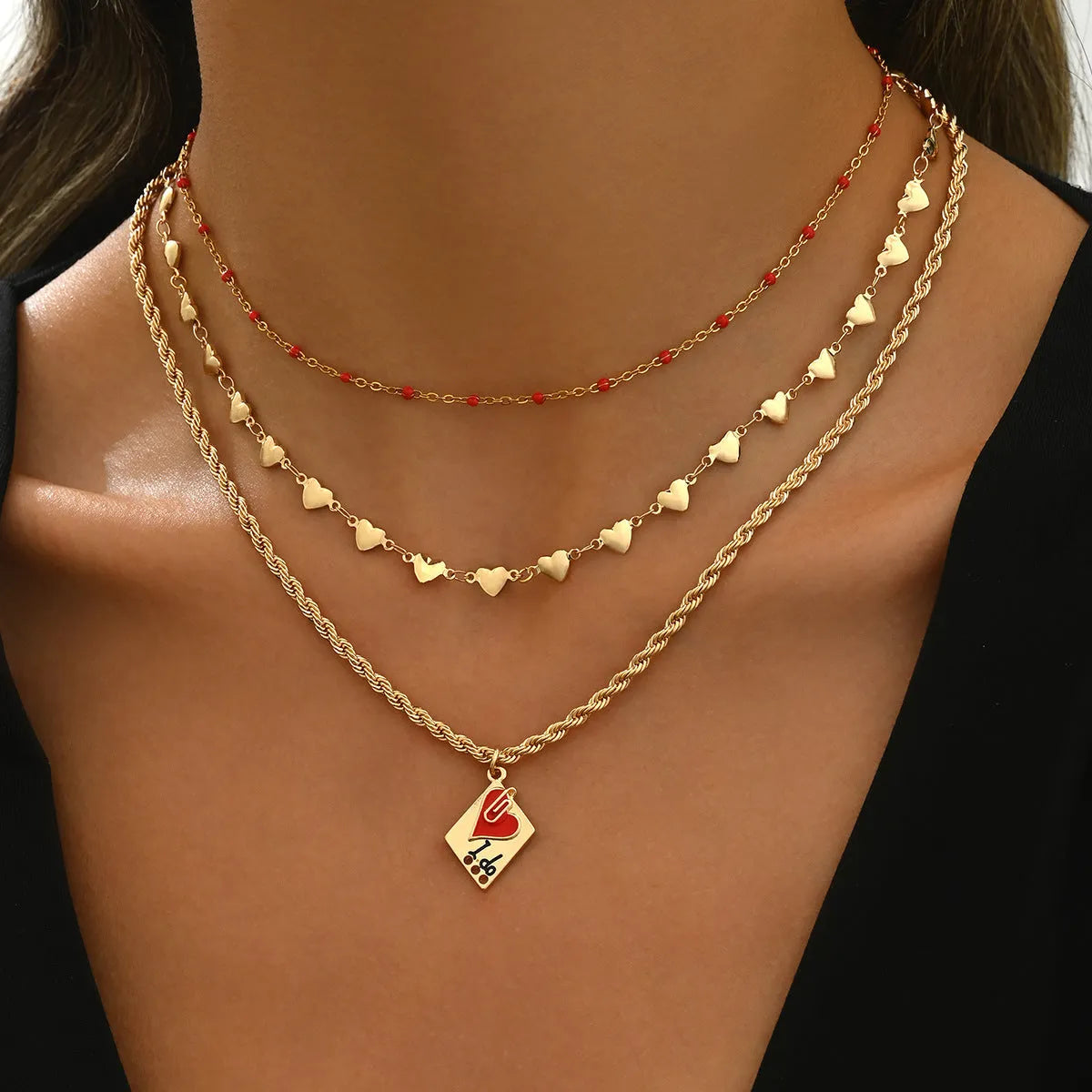 Adjustable geometric heart clavicle necklace with three-layer zinc alloy pendant on chain