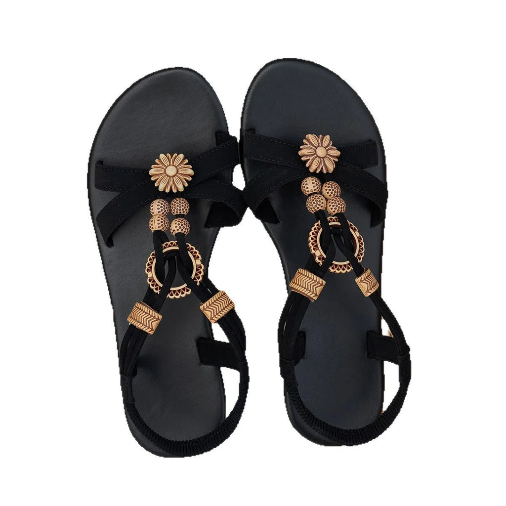 Black ethnic style women's sandals with beaded weave detailing and elastic band wearing method